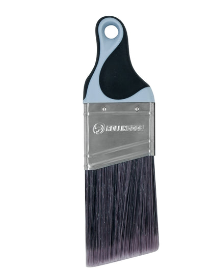 Close-up of synthetic SRT filaments and angled brush tip