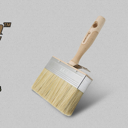 Doberman paint brush with wooden handle and bristle head on a gray background