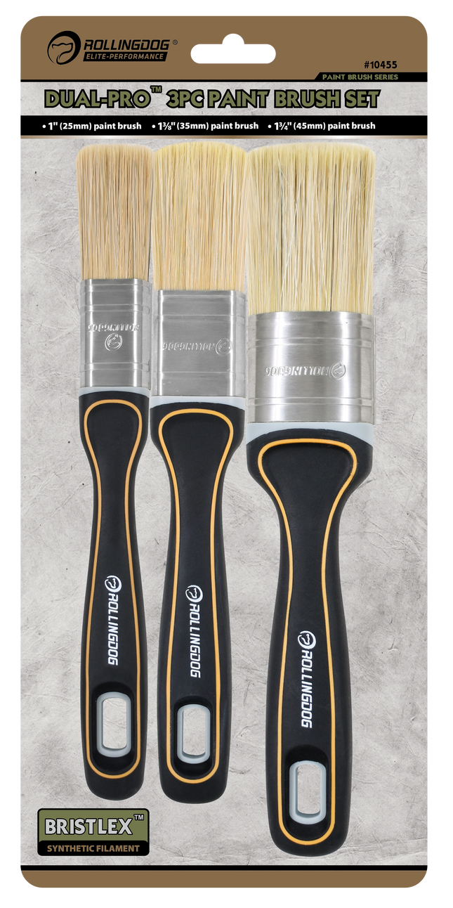 Set of three paint brushes with black handles and bristle heads on a gray background