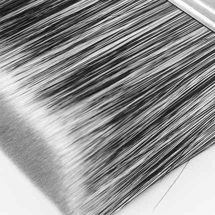 Close-up of a stack of books with a unique binding design on a white background