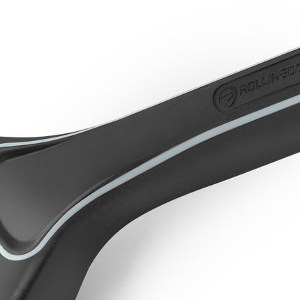 Deck paint brush with rubber handle and wooden base and stainless steele ferule on a white background