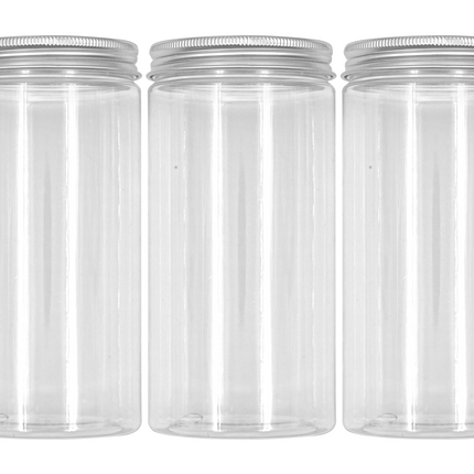 Three clear plastic jars with metal lids on a white background