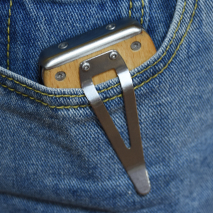 50217_Folding painter’s tool clipped to work belt for easy carry