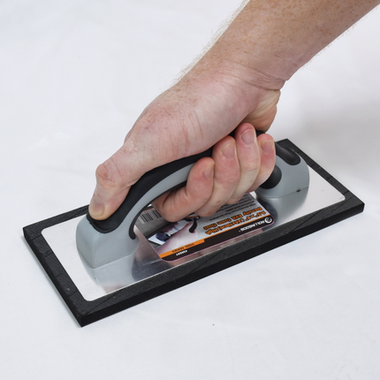 50297-Worker finishing stucco wall using high density EVA foam float