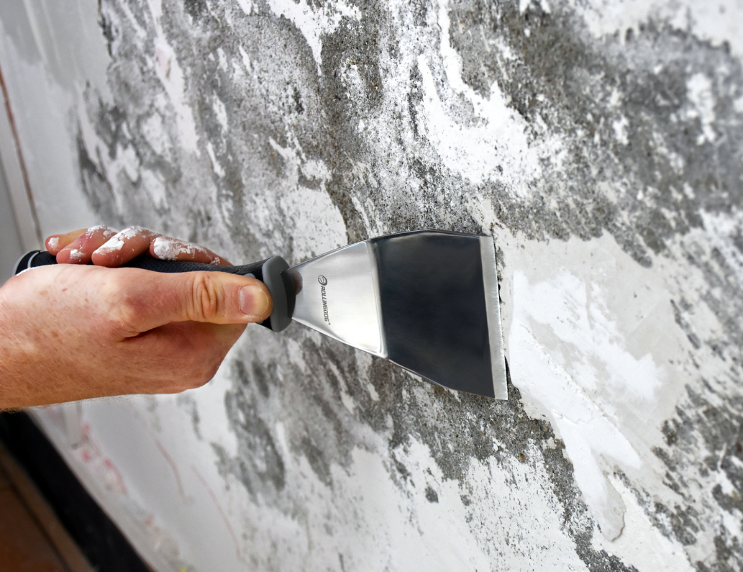 50448-painter using scraper on a surface