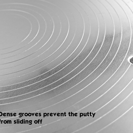 50551-Close-up of circular grooves and off-center ergonomic handle