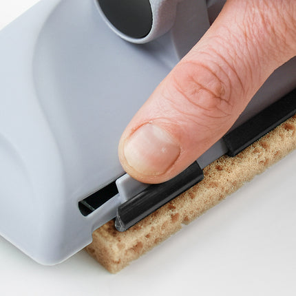 Person locking in pad to pro angle deck staining tool